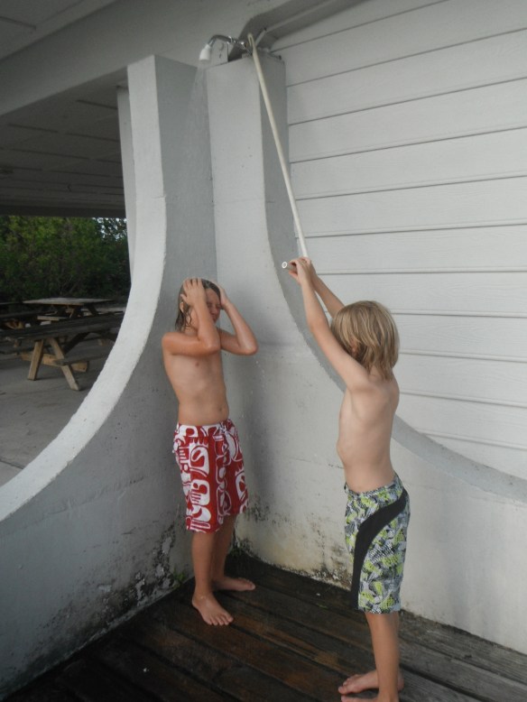 Cold holding down the shower pull for Logan.