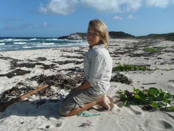Logan on one of our beach exploration days. I found my first hamburger bean this day!