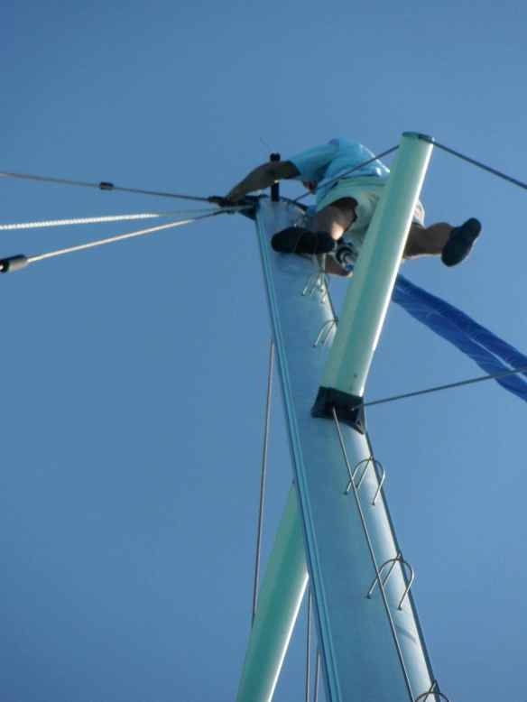 Mark climbing the neighbors mast.