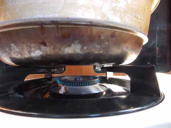 This is the flame height that works for us.  Not too high, closer to the  lowest flame possible.