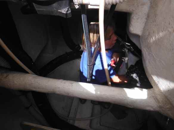 Logan in a lazarette on Commotion.  Anyone shorter than 5 feet is a plus for this job.