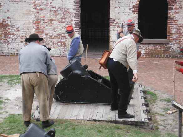 Preparing to fire a mortar.