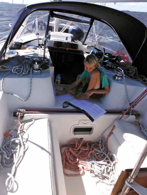 Cole doing schoolworks as we sail along.  You can see where our mascot resides above the instruments.